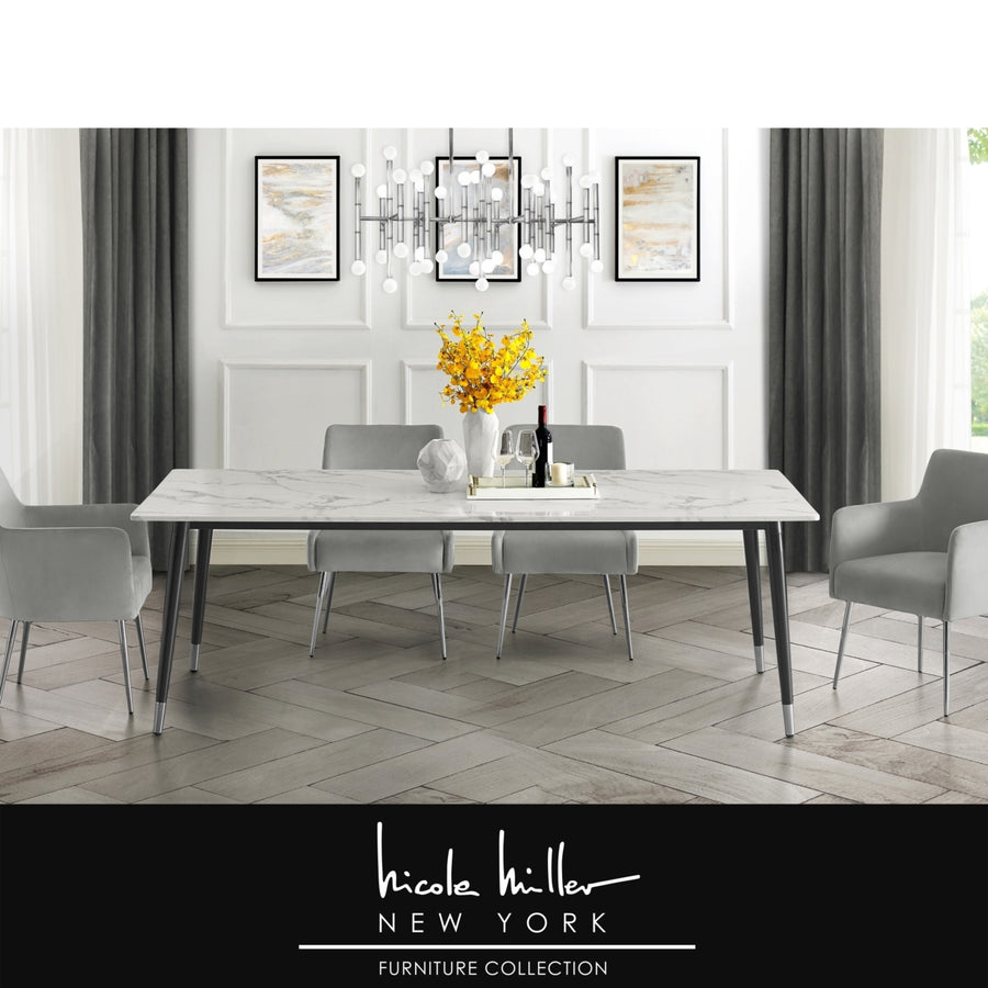 Nicole Miller Vivaan Dining Table-Rectangular Marble Top-Metal Black Leg Silver Tip-Modern Design Image 1