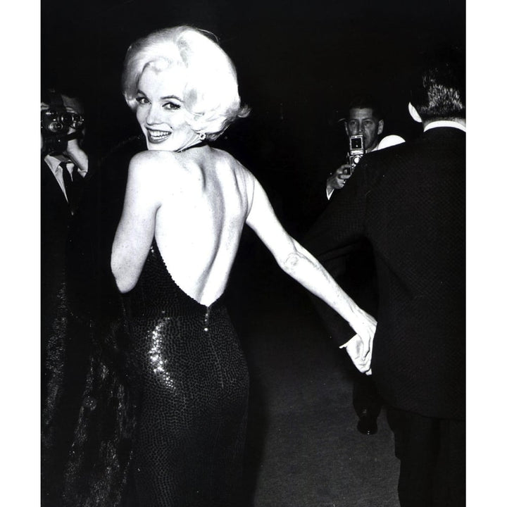 Marilyn Monroe looking over her shoulder wearing an evening dress Photo Print Image 1