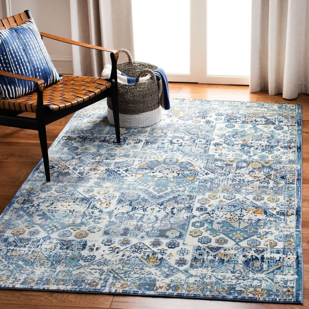 SAFAVIEH Aria Collection ARA745A Ivory / Navy Rug Image 3