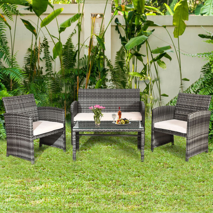 Gymax 4PCS Patio Outdoor Rattan Furniture Set w/ Cushioned Chair Loveseat Table Image 3