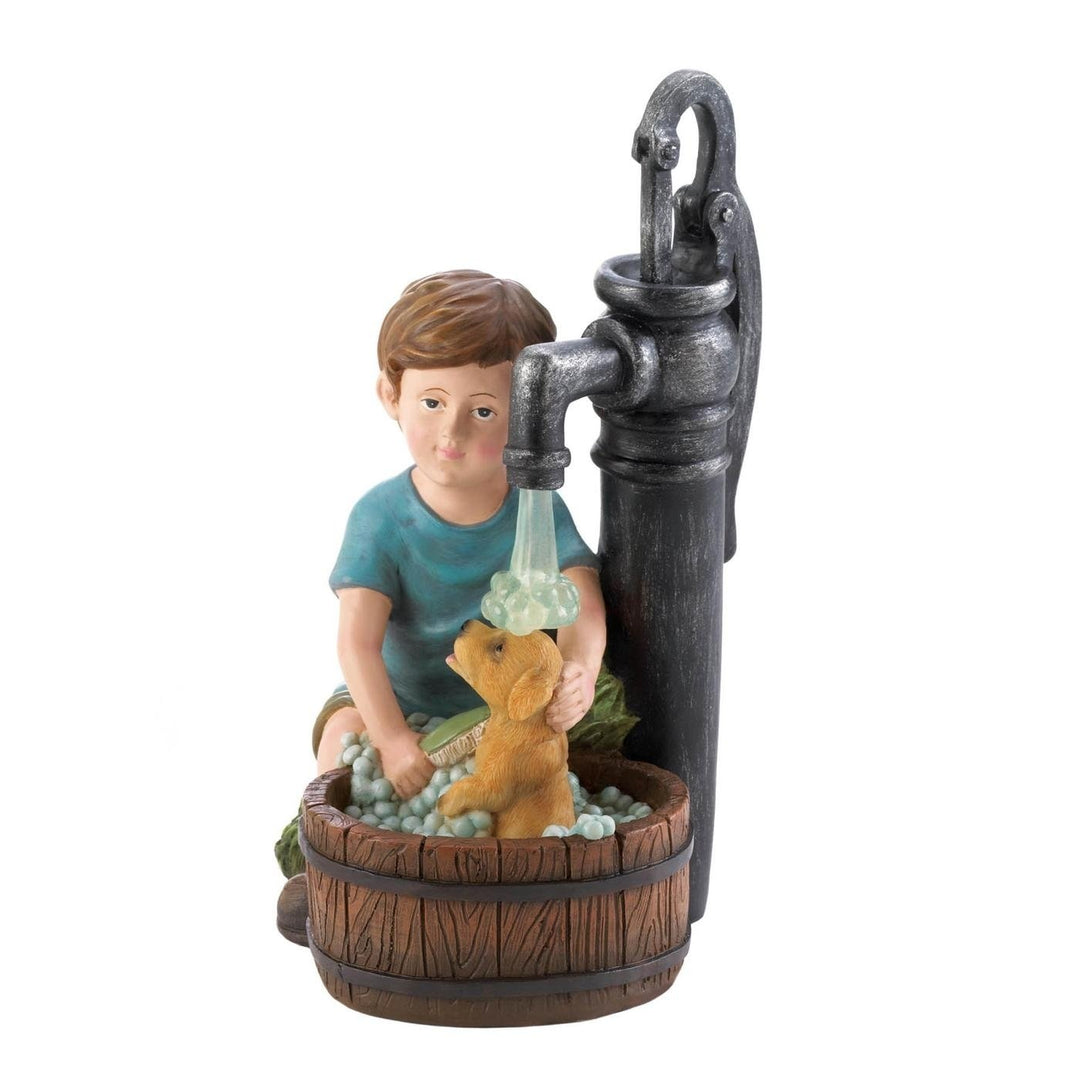 BOY AND DOG SOLAR GARDEN STATUE Image 1