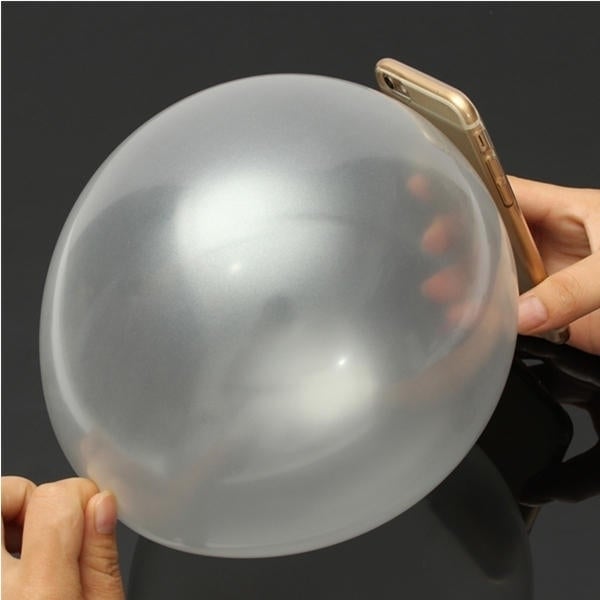 Close Up Magic Street Trick Mobile Into Balloon Penetration In A Flash Party Image 3