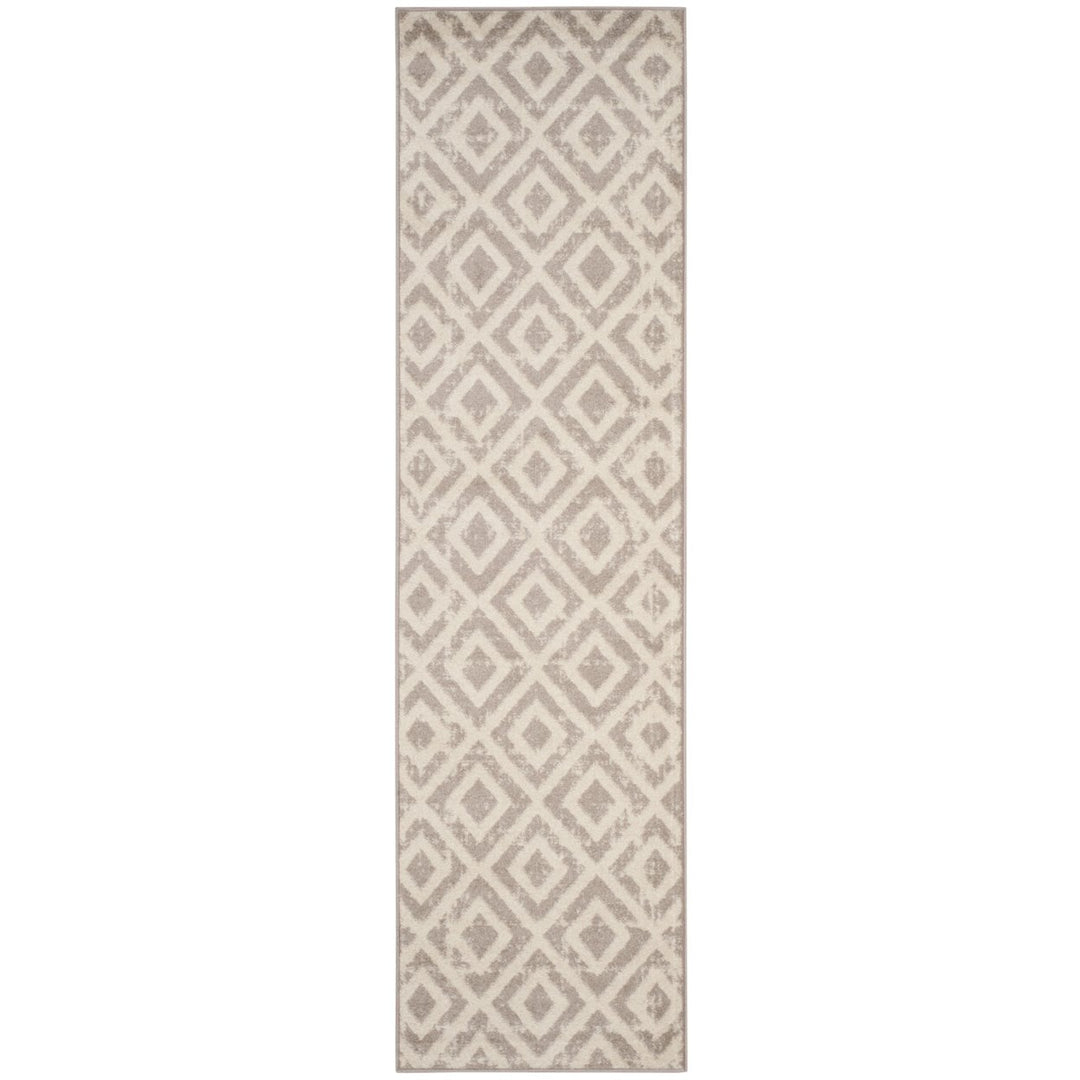 SAFAVIEH Amsterdam Collection AMS105A Ivory / Mauve Rug Image 1