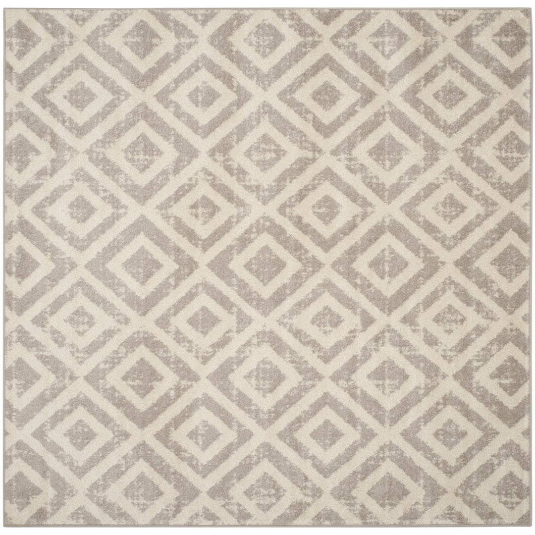 SAFAVIEH Amsterdam Collection AMS105A Ivory / Mauve Rug Image 1