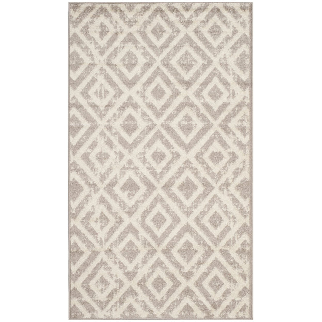 SAFAVIEH Amsterdam Collection AMS105A Ivory / Mauve Rug Image 8