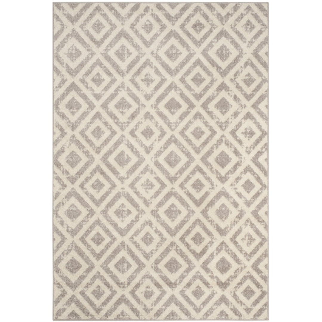 SAFAVIEH Amsterdam Collection AMS105A Ivory / Mauve Rug Image 9