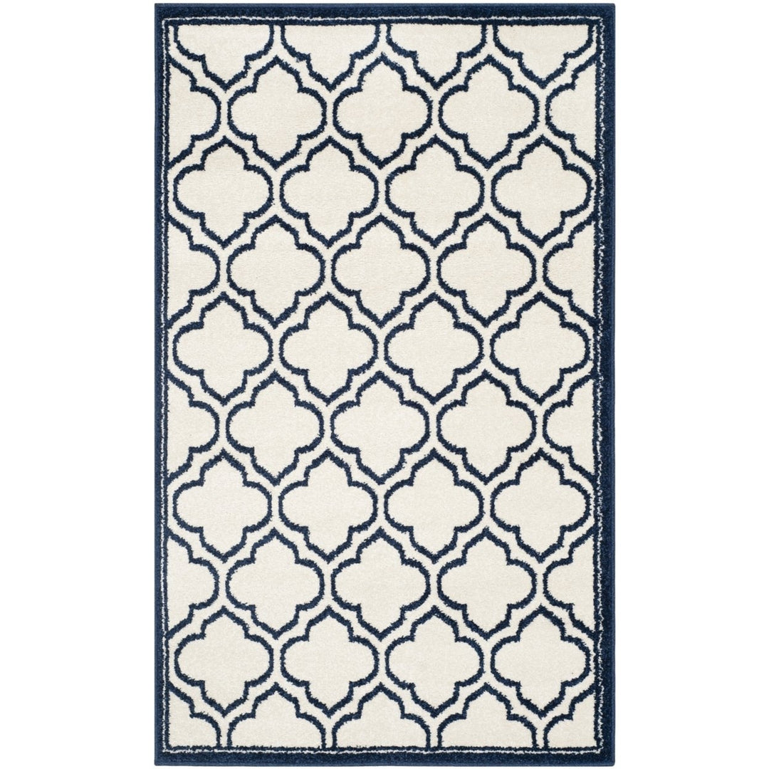 SAFAVIEH Amherst Collection AMT412M Ivory / Navy Rug Image 1