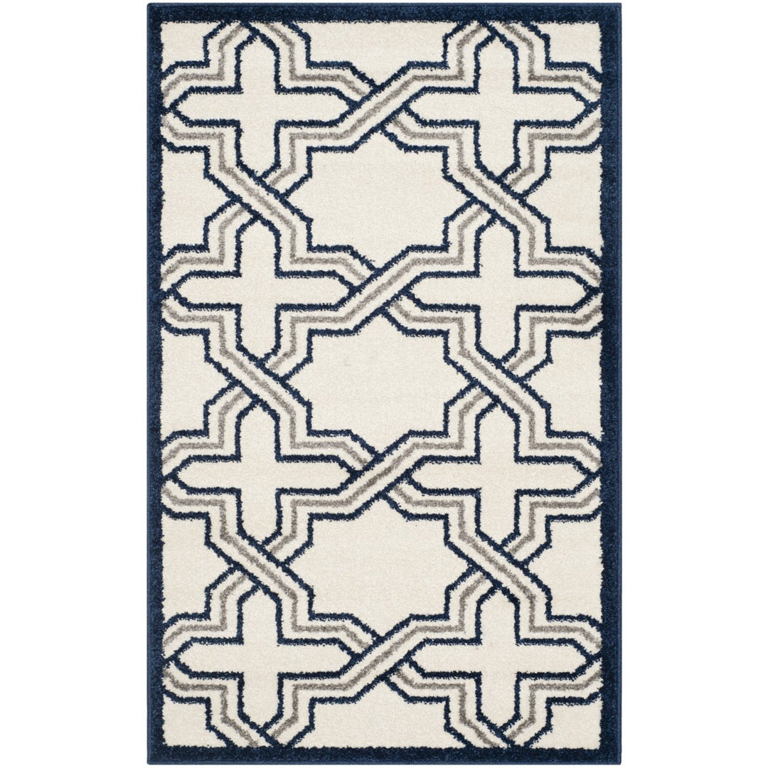 SAFAVIEH Amherst Collection AMT413M Ivory / Navy Rug Image 1