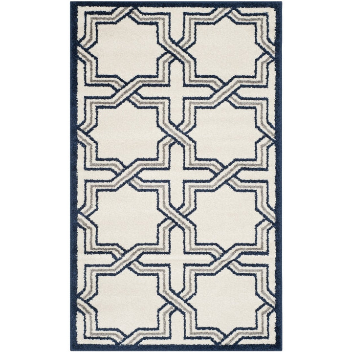 SAFAVIEH Amherst Collection AMT413M Ivory / Navy Rug Image 1