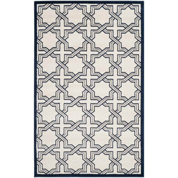 SAFAVIEH Amherst Collection AMT413M Ivory / Navy Rug Image 1