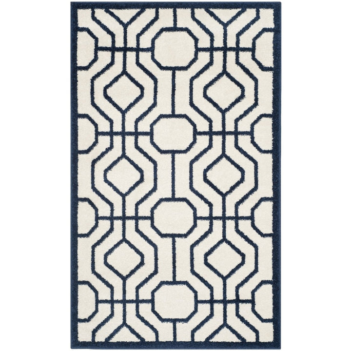 SAFAVIEH Amherst Collection AMT416M Ivory / Navy Rug Image 1