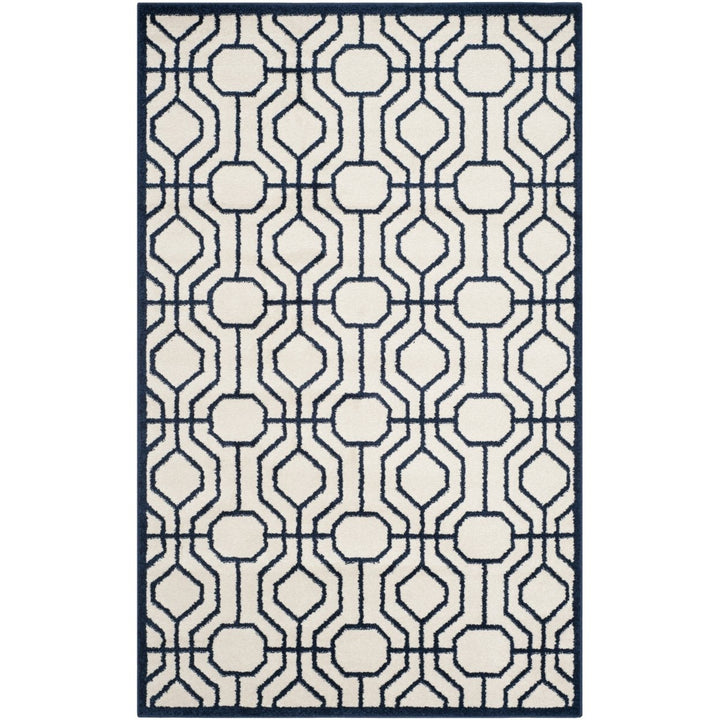 SAFAVIEH Amherst Collection AMT416M Ivory / Navy Rug Image 1