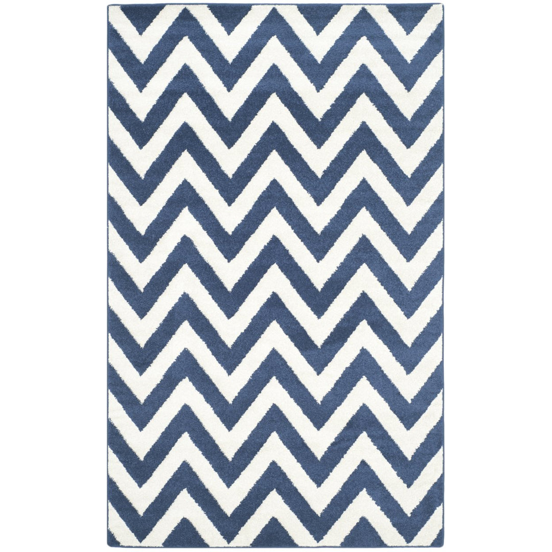 SAFAVIEH Amherst Collection AMT419P Navy / Beige Rug Image 1