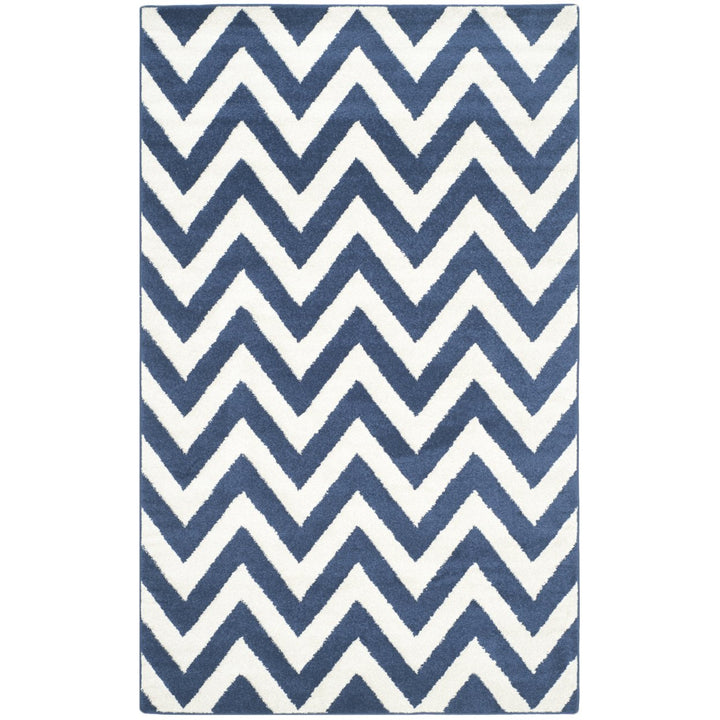 SAFAVIEH Amherst Collection AMT419P Navy / Beige Rug Image 1