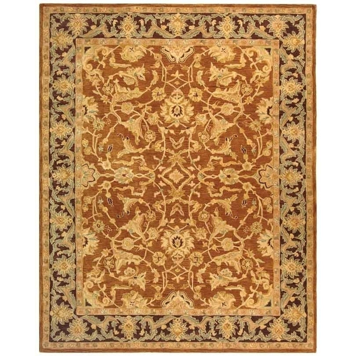 SAFAVIEH Anatolia AN545A Handmade Brown / Plum Rug Image 1