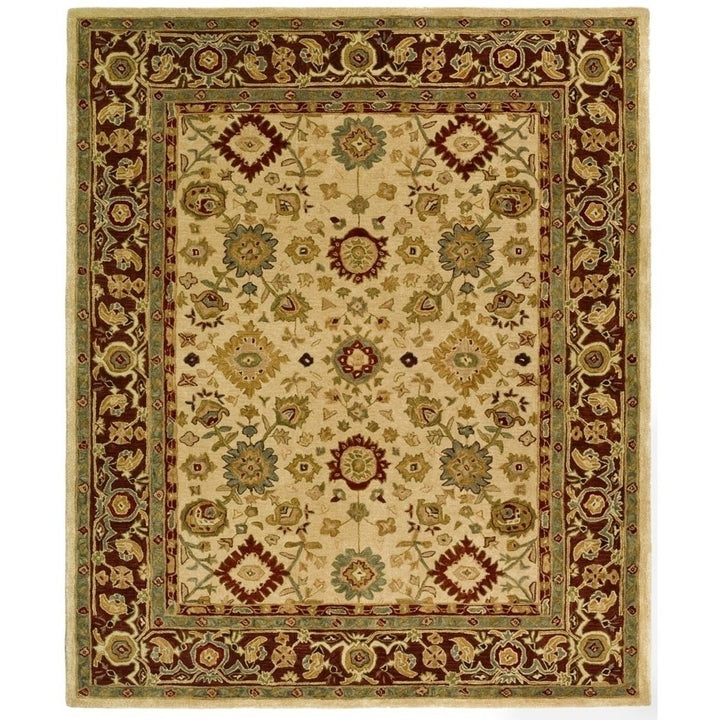 SAFAVIEH Anatolia AN546A Handmade Ivory / Brown Rug Image 1