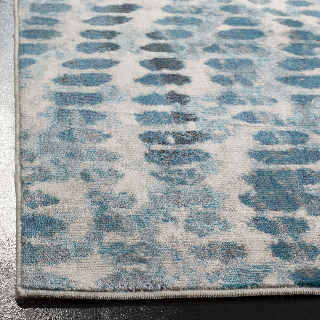 SAFAVIEH Aria Collection ARA121A Cream / Teal Rug Image 4