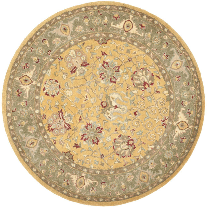 SAFAVIEH Antiquity Collection AT21C Handmade Gold Rug Image 1