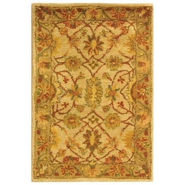 SAFAVIEH Antiquity AT17A Handmade Ivory /Light Green Rug Image 1