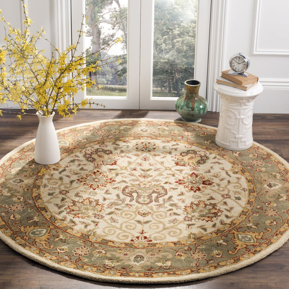 SAFAVIEH Antiquity Collection AT21F Handmade Ivory Rug Image 2