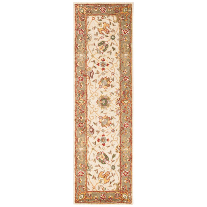 SAFAVIEH Antiquity Collection AT21F Handmade Ivory Rug Image 5