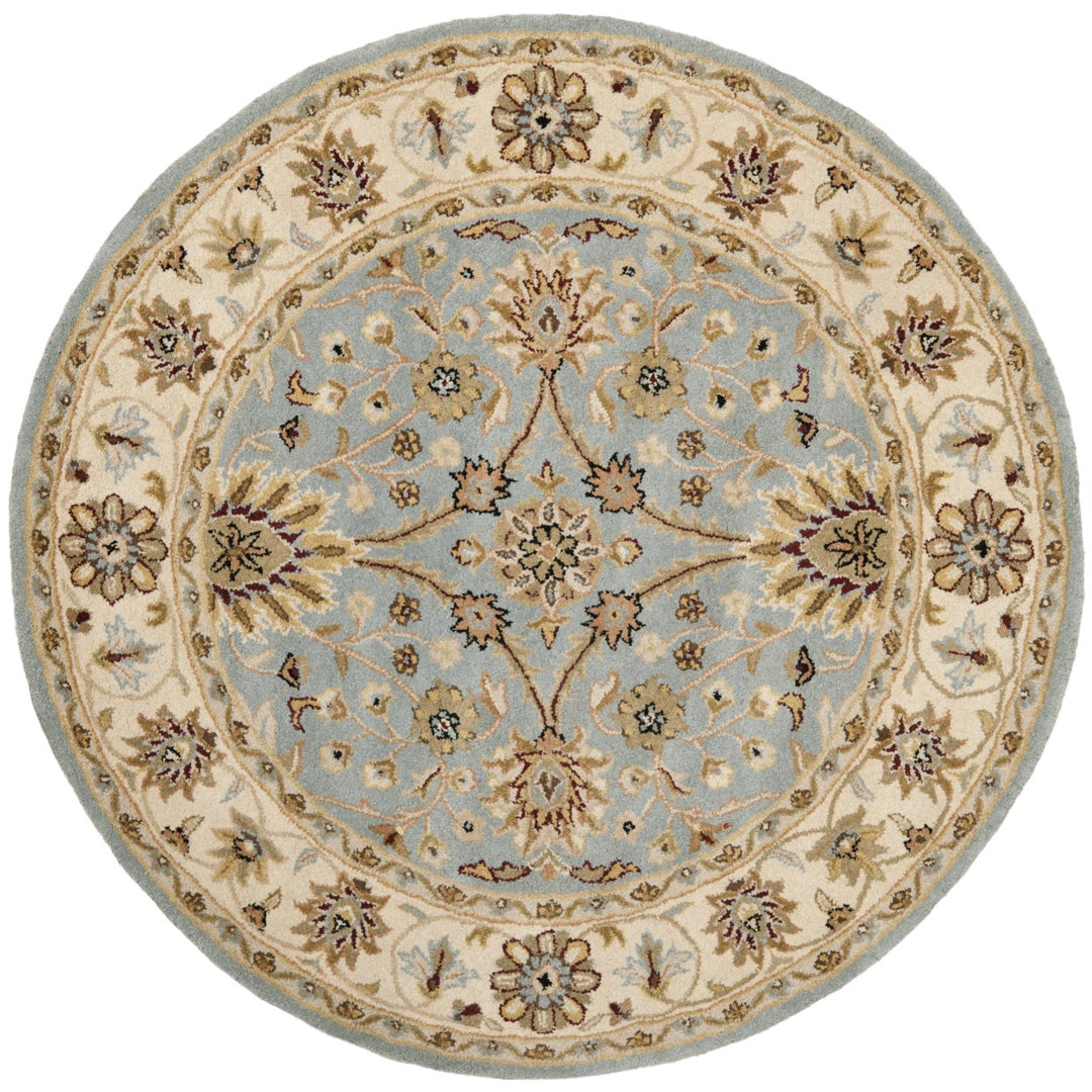 SAFAVIEH Antiquity AT249A Handmade Light Blue /Ivory Rug Image 1