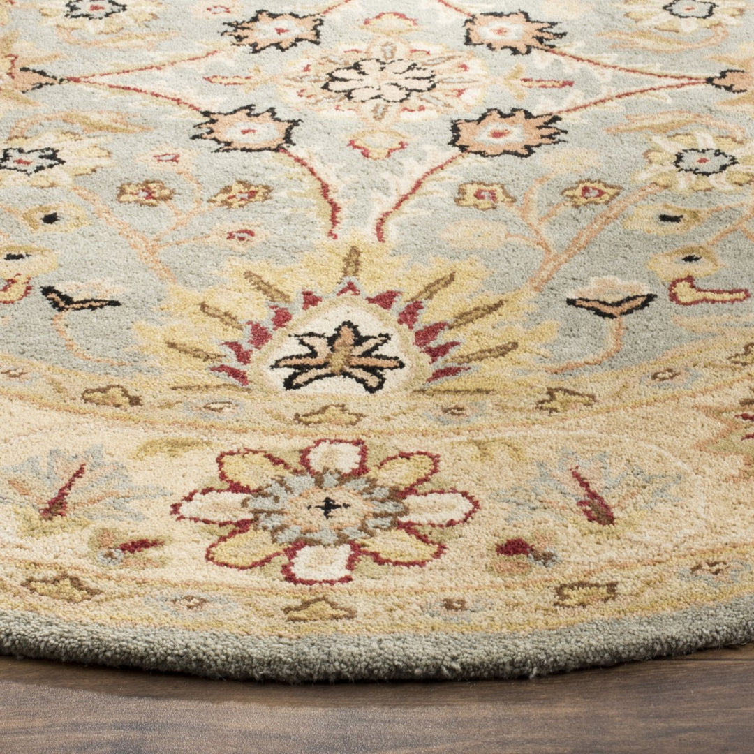 SAFAVIEH Antiquity AT249A Handmade Light Blue /Ivory Rug Image 6