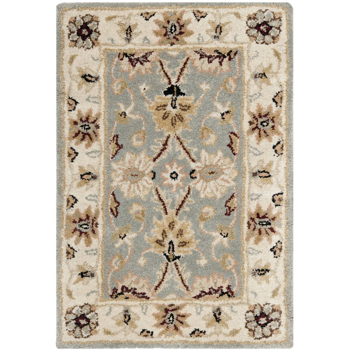 SAFAVIEH Antiquity AT249A Handmade Light Blue /Ivory Rug Image 1