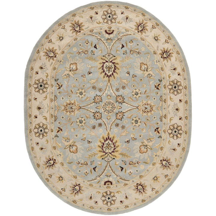 SAFAVIEH Antiquity AT249A Handmade Light Blue /Ivory Rug Image 1