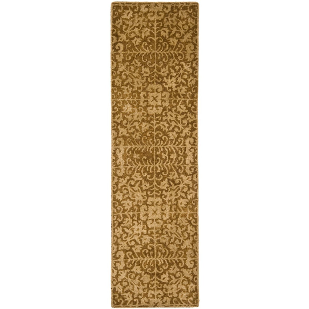 SAFAVIEH Antiquity AT411A Handmade Gold / Beige Rug Image 3