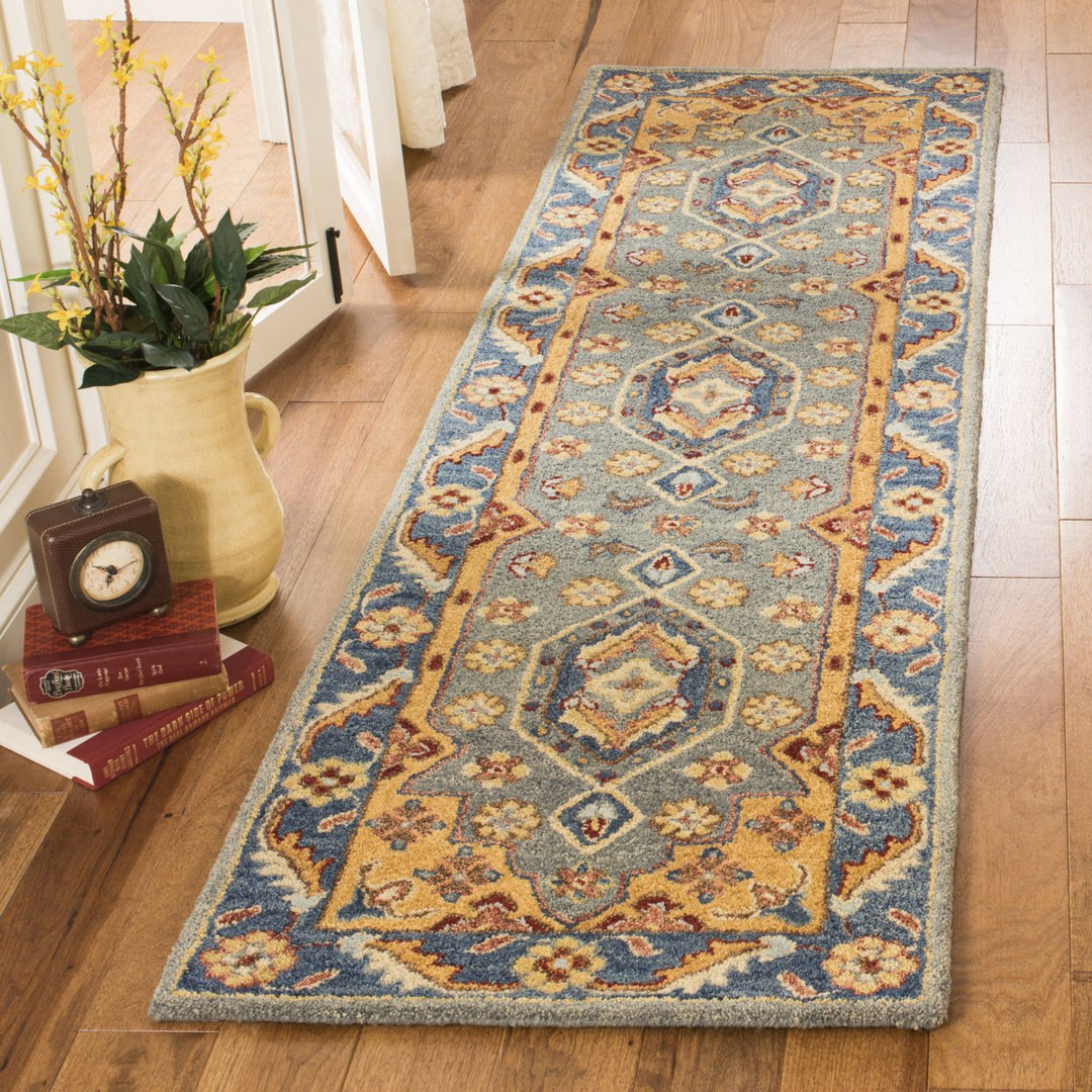 SAFAVIEH Antiquity AT504M Handmade Blue / Gold Rug Image 9