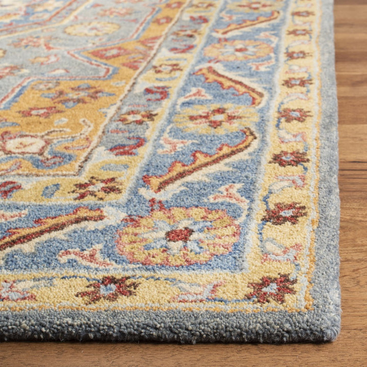 SAFAVIEH Antiquity AT504M Handmade Blue / Gold Rug Image 10