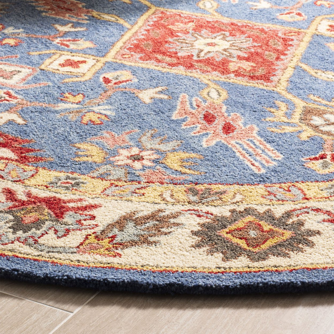 SAFAVIEH Antiquity AT506M Handmade Blue / Red Rug Image 7