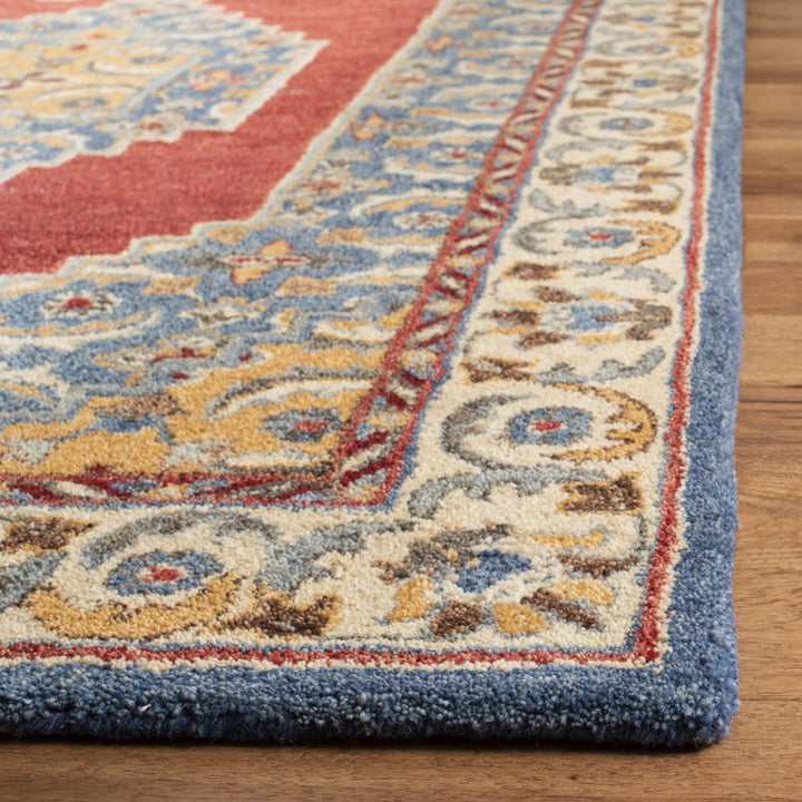 SAFAVIEH Antiquity AT505M Handmade Blue / Red Rug Image 10