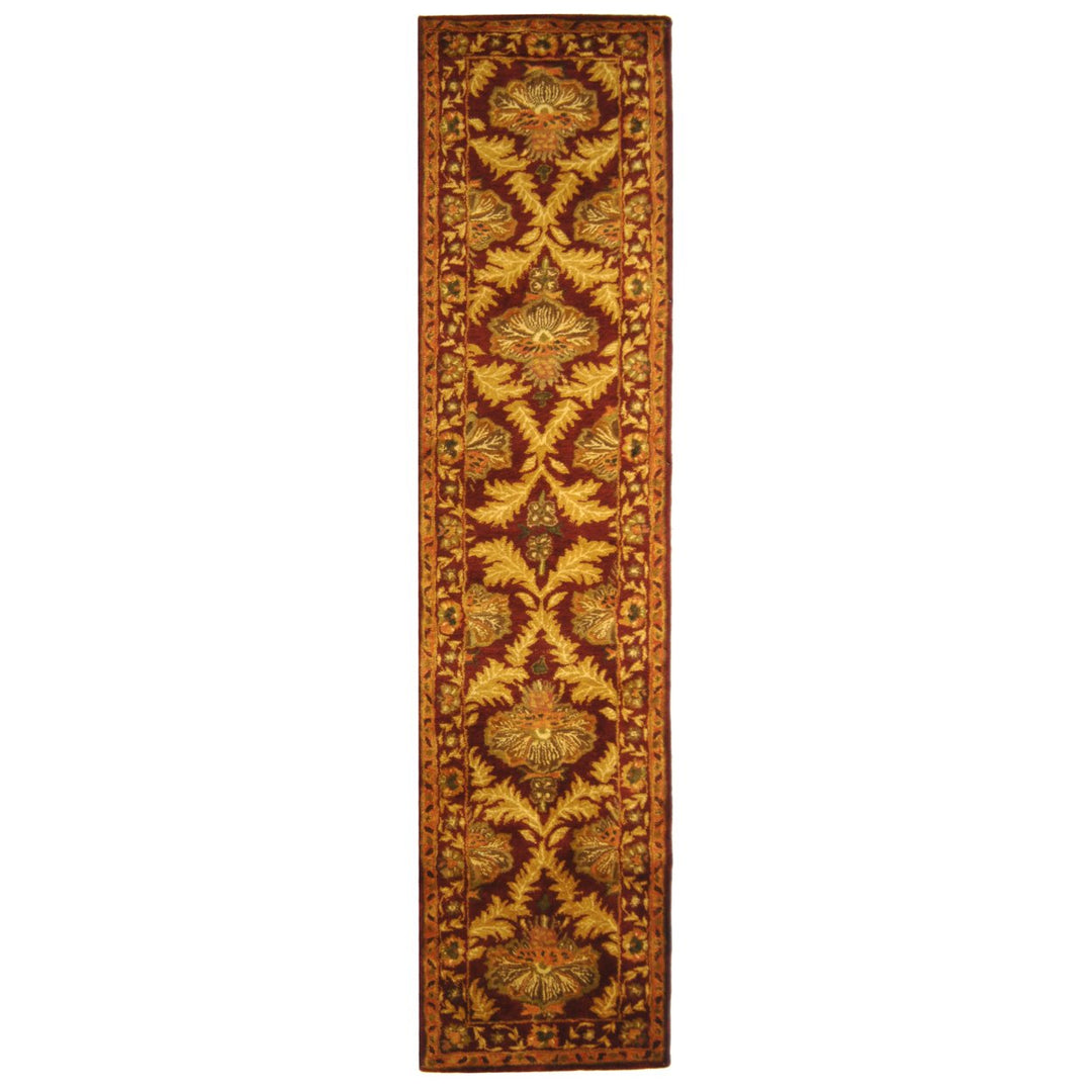 SAFAVIEH Antiquity AT54A Handmade Wine / Gold Rug Image 1