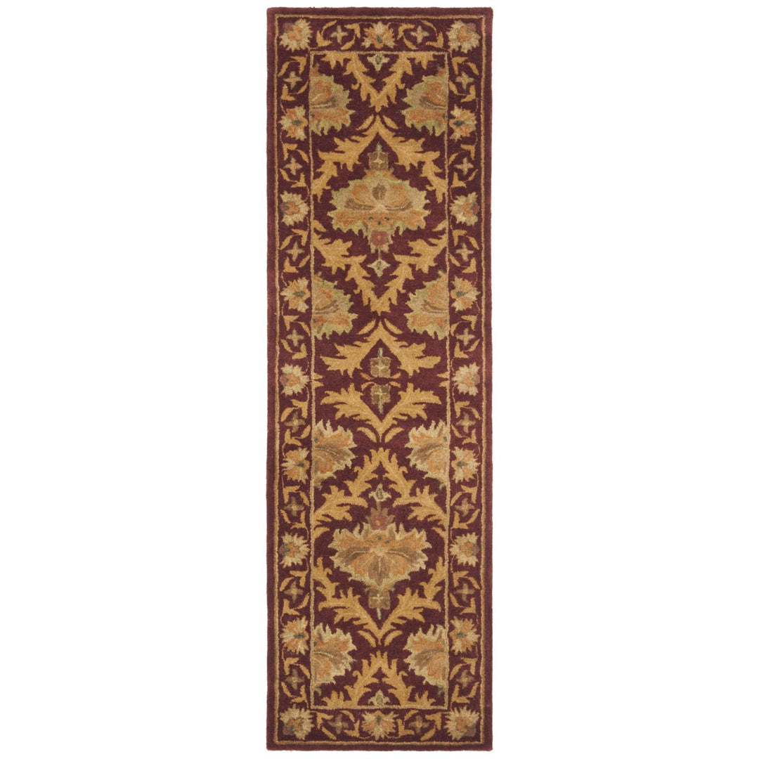 SAFAVIEH Antiquity AT54A Handmade Wine / Gold Rug Image 1