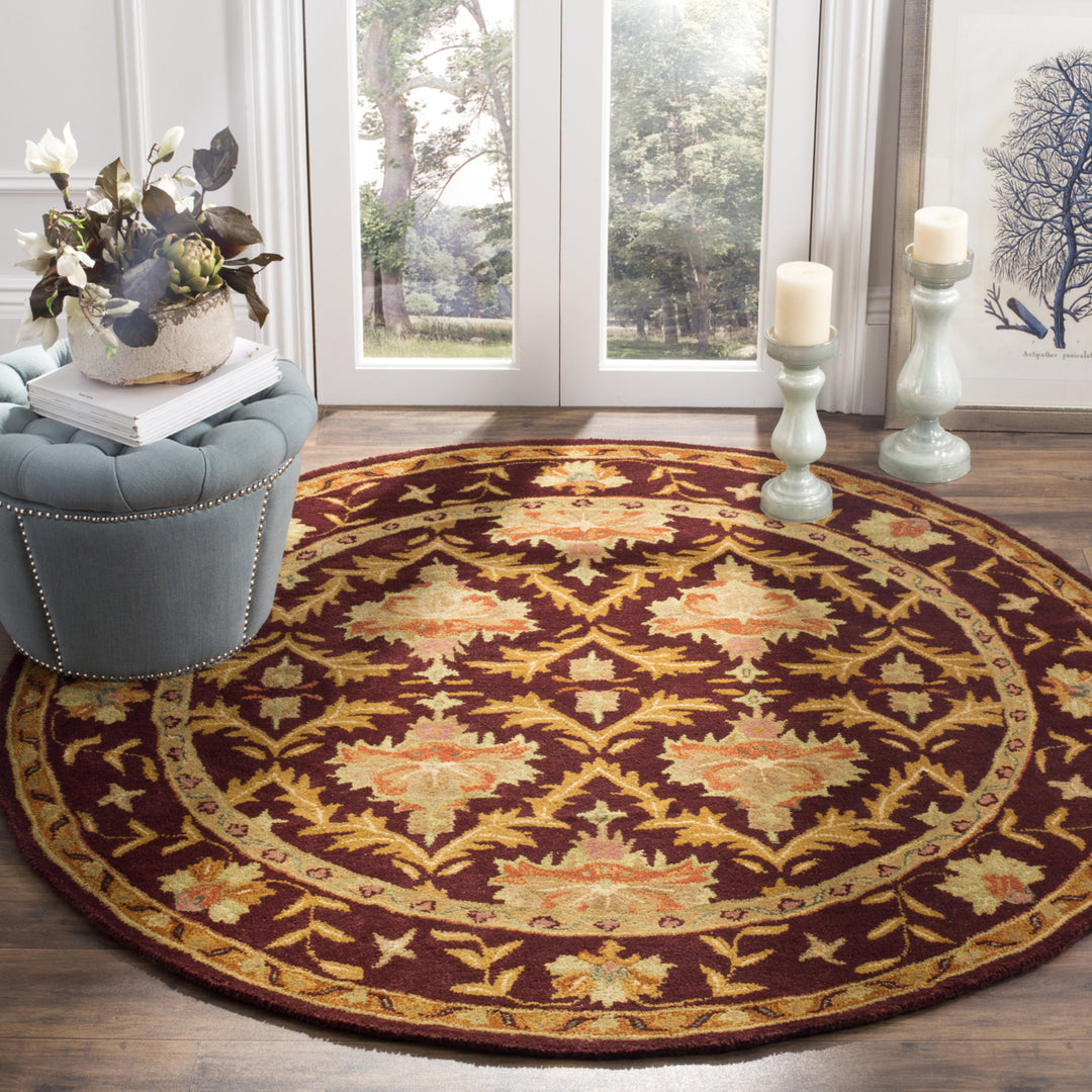 SAFAVIEH Antiquity AT54A Handmade Wine / Gold Rug Image 10