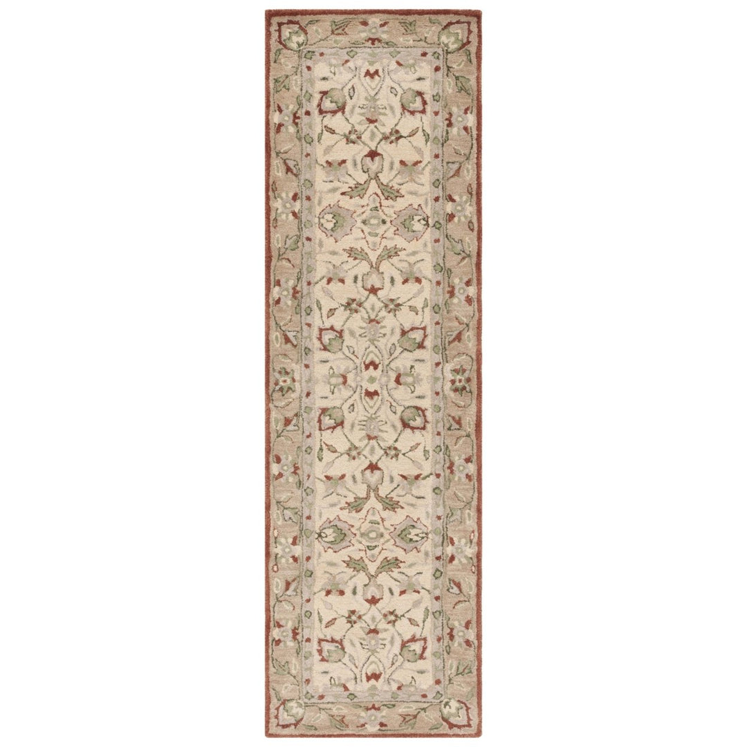 SAFAVIEH Antiquity AT65P Handmade Rust / Ivory Rug Image 1