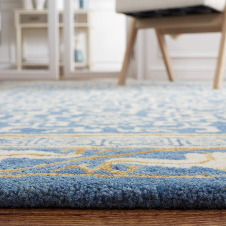 SAFAVIEH Antiquity AT860M Handmade Blue / Ivory Rug Image 3