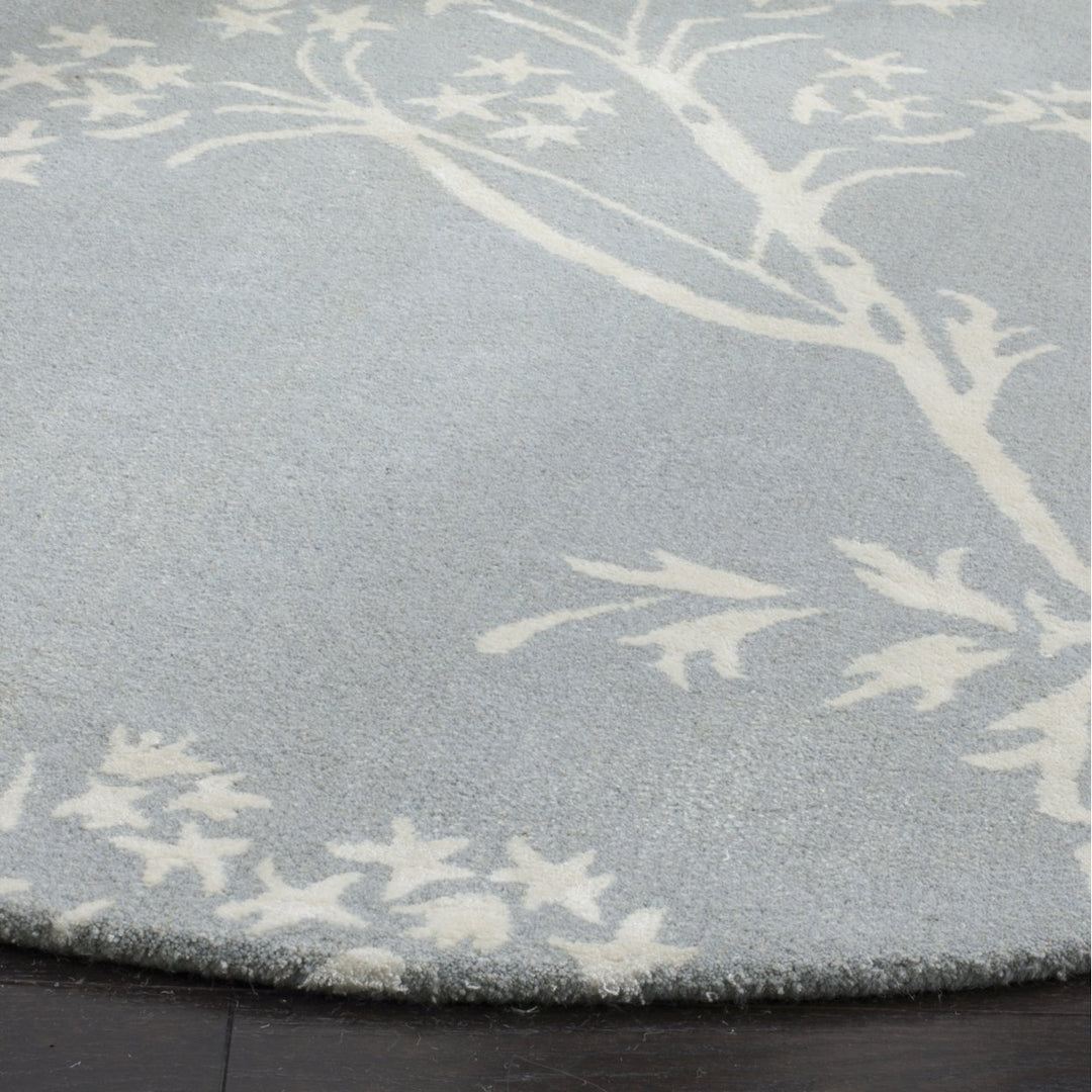 SAFAVIEH Bella BEL131A Handmade Light Blue / Ivory Rug Image 7