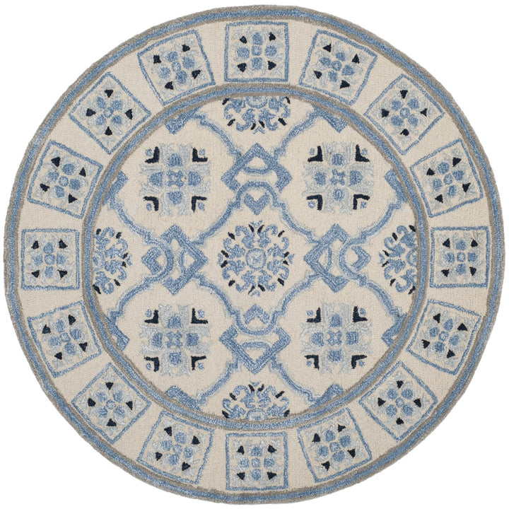 SAFAVIEH Bella BEL155A Handmade Ivory / Blue Rug Image 1