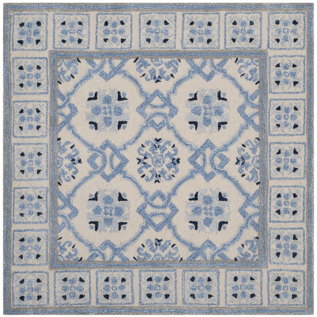 SAFAVIEH Bella BEL155A Handmade Ivory / Blue Rug Image 1