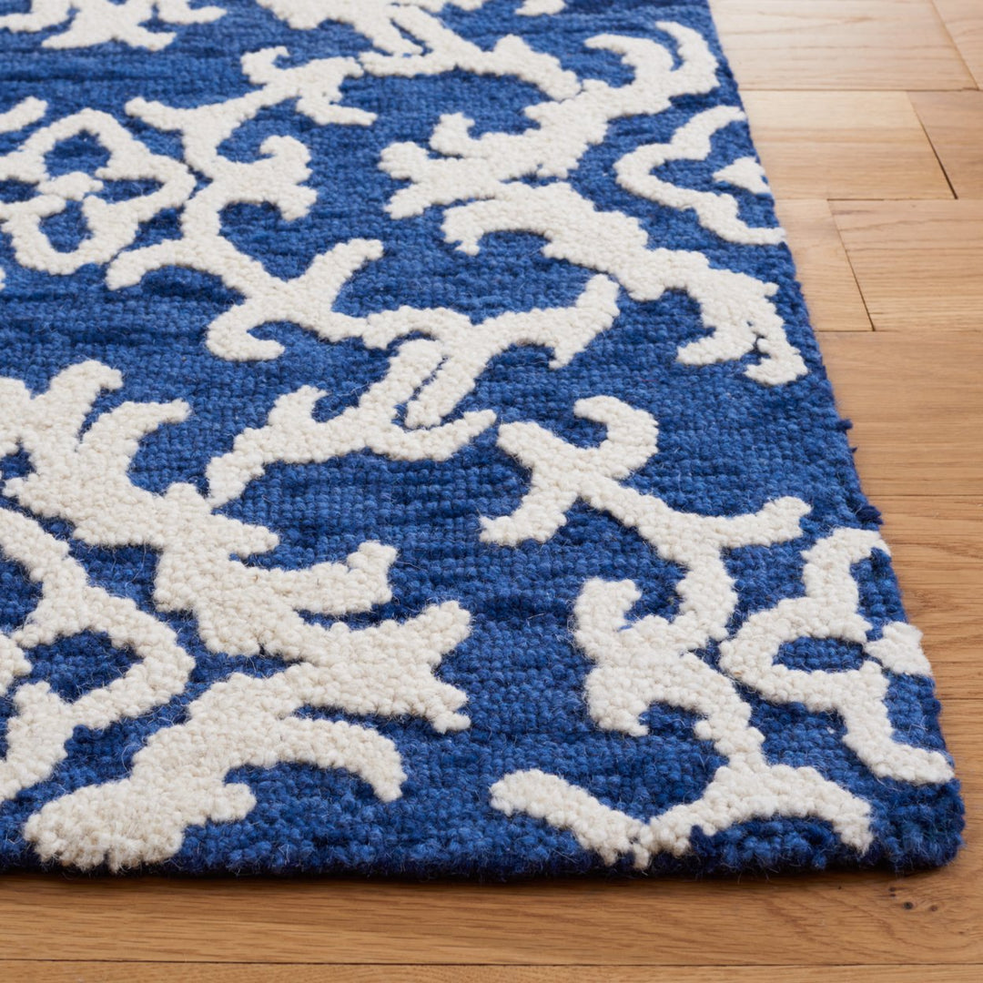 SAFAVIEH Blossom BLM104N Handmade Navy / Ivory Rug Image 6