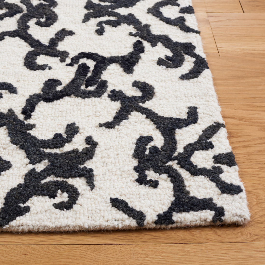 SAFAVIEH Blossom BLM104B Handmade Ivory / Black Rug Image 6