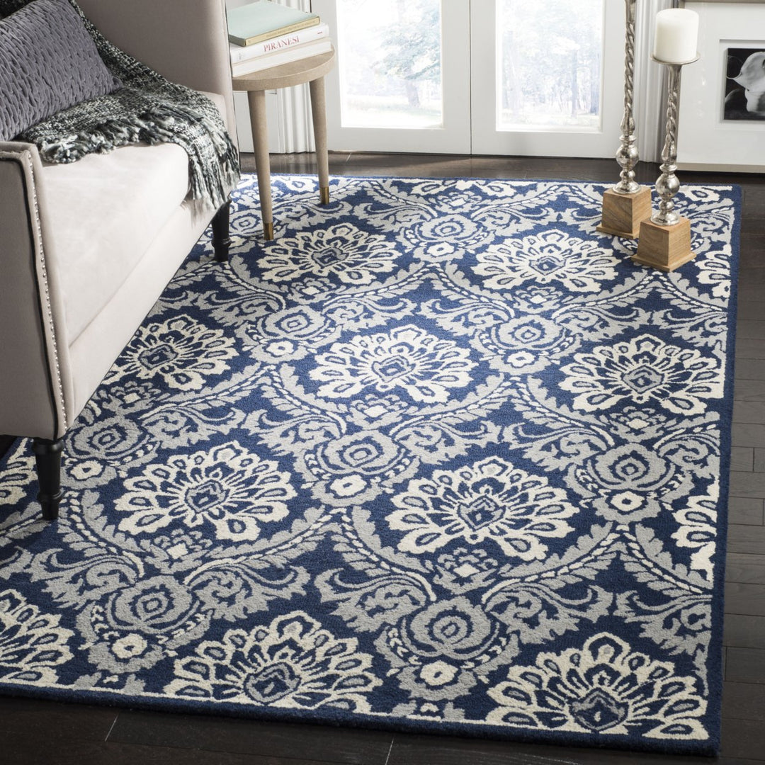 SAFAVIEH Blossom BLM106B Handmade Navy / Ivory Rug Image 1