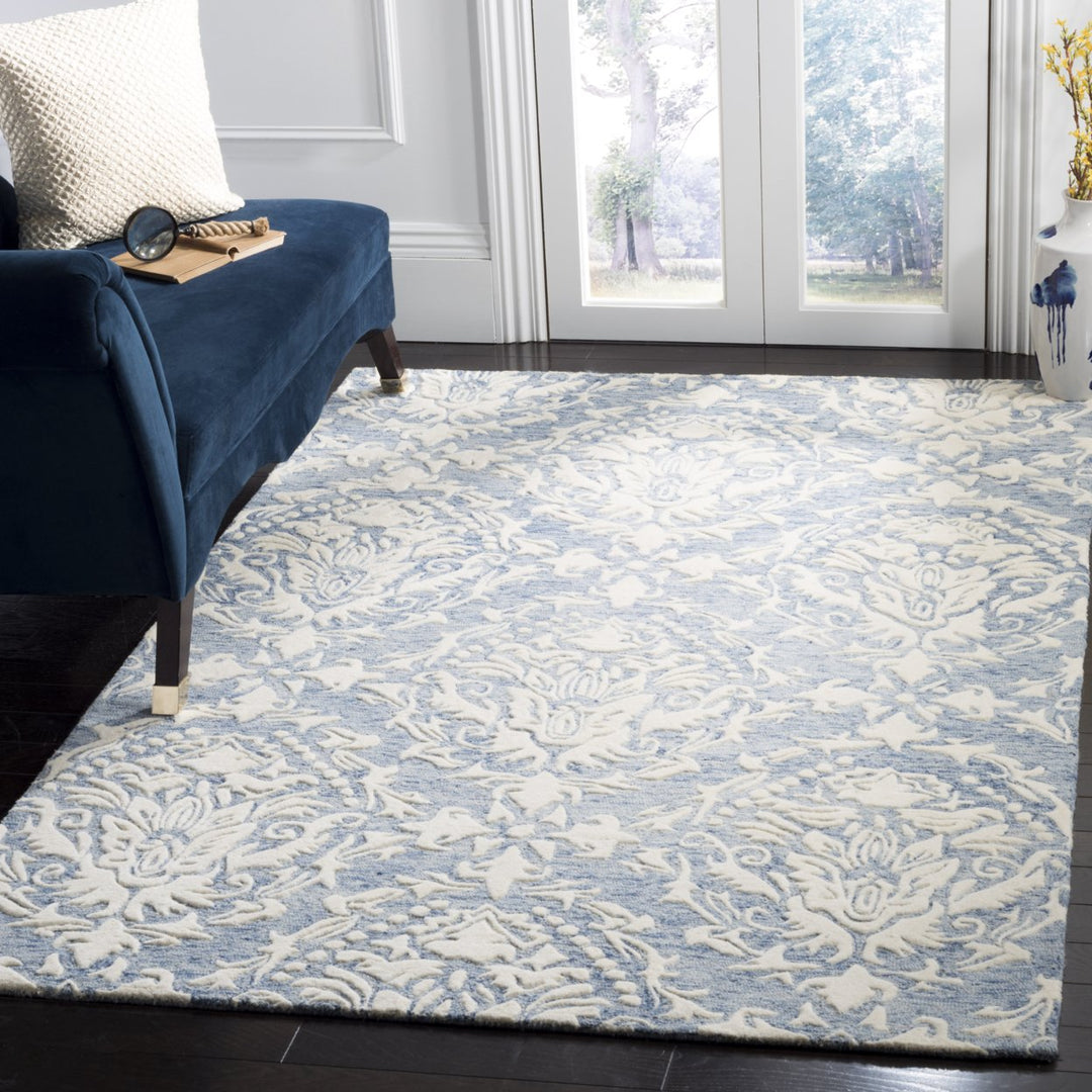 SAFAVIEH Blossom BLM107B Handmade Blue / Ivory Rug Image 1