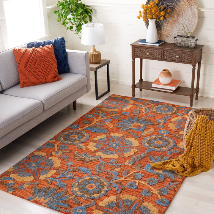 SAFAVIEH Blossom BLM175P Handmade Rust / Blue Rug Image 1