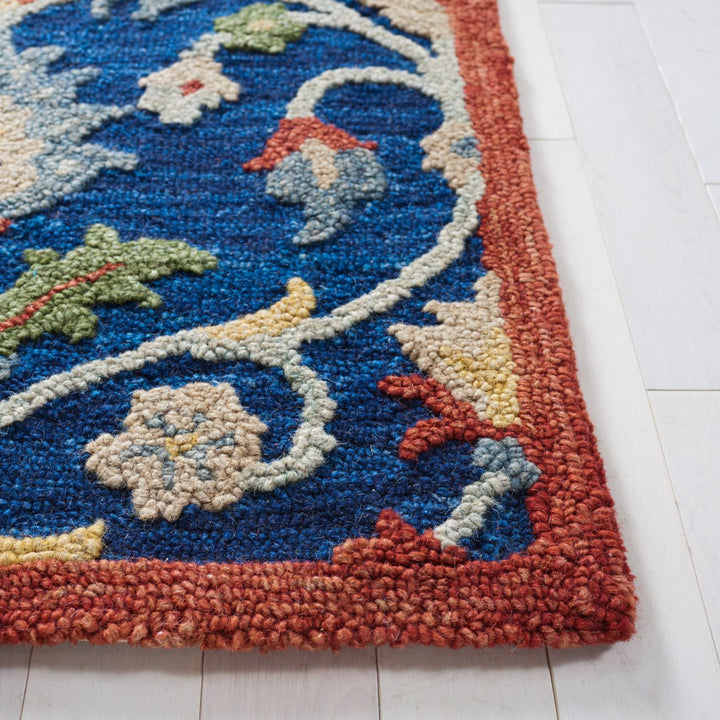 SAFAVIEH Blossom BLM562M Handmade Blue / Rust Rug Image 7