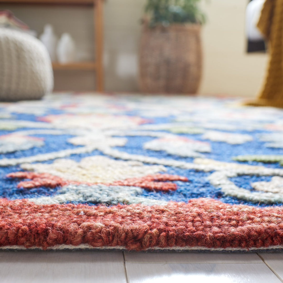 SAFAVIEH Blossom BLM562M Handmade Blue / Rust Rug Image 8