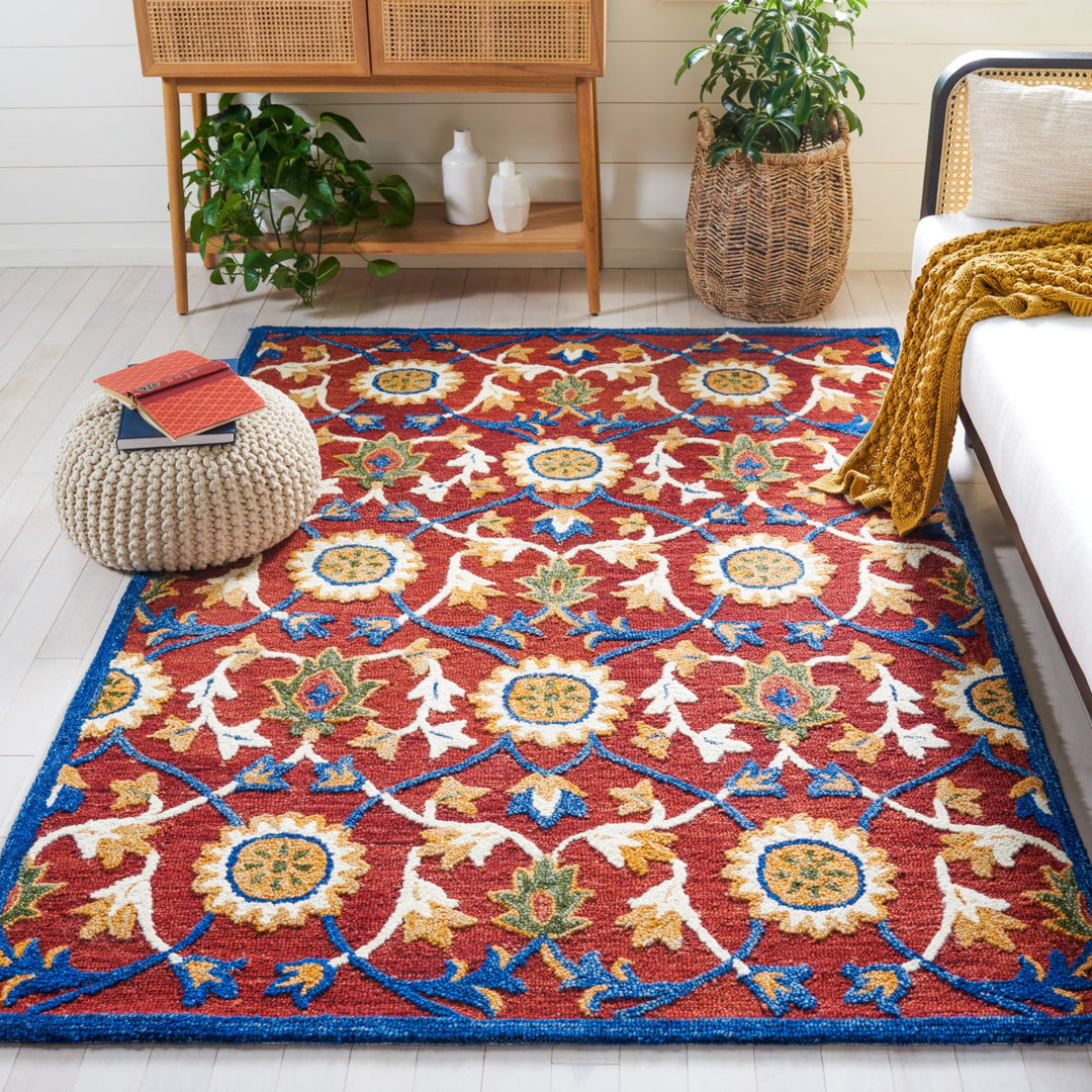 SAFAVIEH Blossom BLM564P Handmade Rust / Blue Rug Image 1